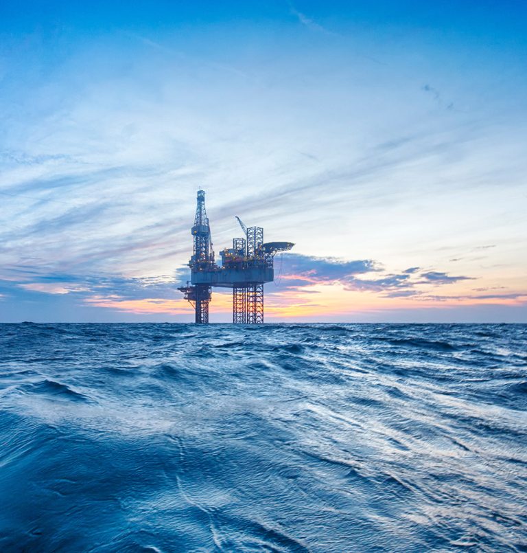 offshore oil and gas platform at dusk