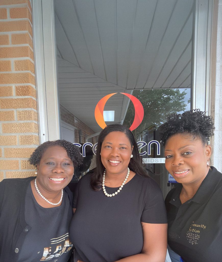 community members meeting together and smiling